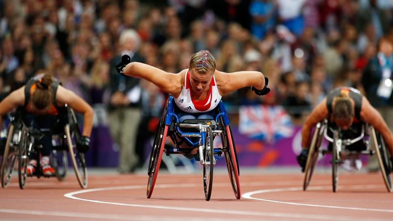 A picture of a woman in a wheelchair during an athletics race