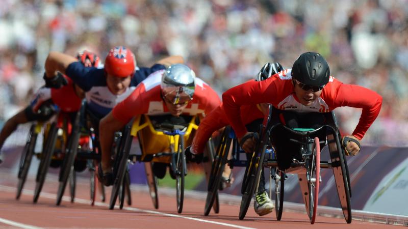 A picture of men in wheelchairs during an athletics race