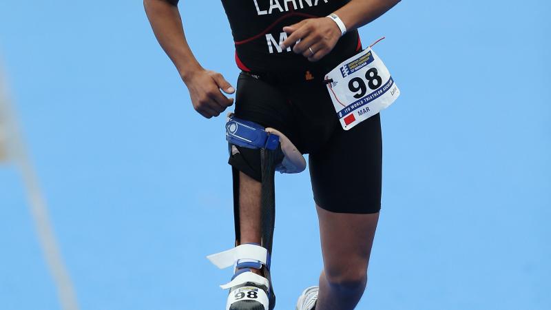 A picture of a man with a prosthesis running