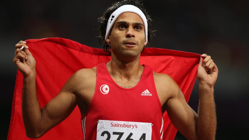 Mohamed Farhat Chida of Tunisia wins gold in the Men's 400m - T38 Final at the London 2012 Paralympic Games 