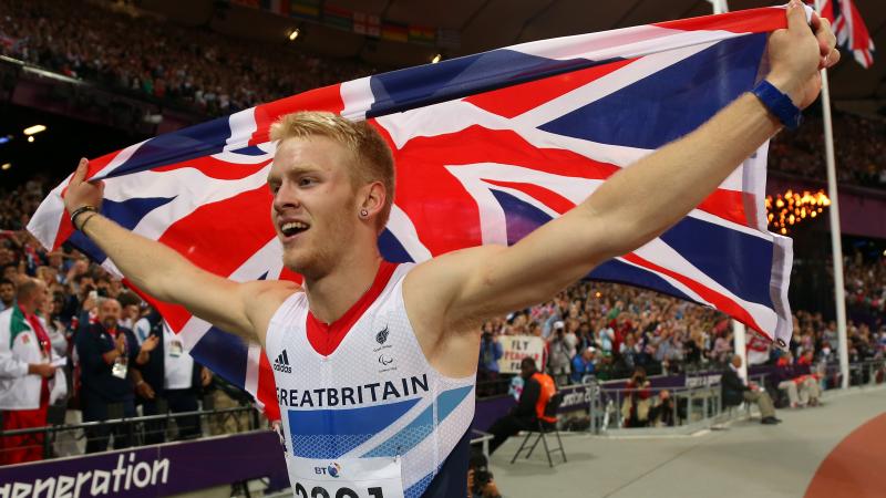 Jonnie Peacock celebrates winning gold in the men's 100m T44 Final on Day 8 of the London 2012 Paralympic Games.