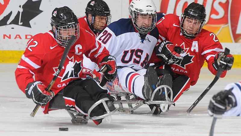 USA and Canada's ice sledge hockey teams