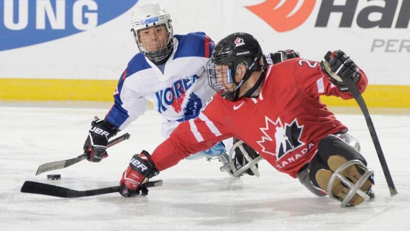 Canada and South Korea's ice sledge hockey teams