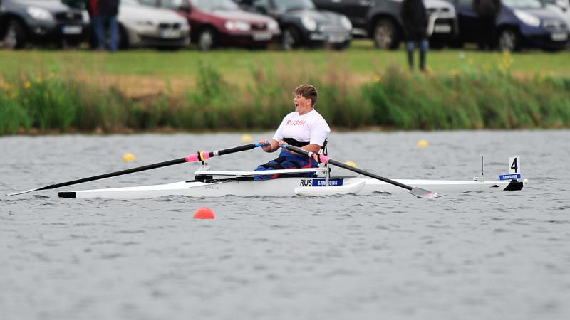 Natalia Bolshakova cheers after winning gold at the 2013 World Rowing Championships.