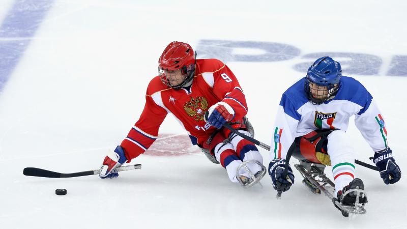 Konstantin Shikhov of Russia (L) is pressured by Gianluigi Rosa of Italy