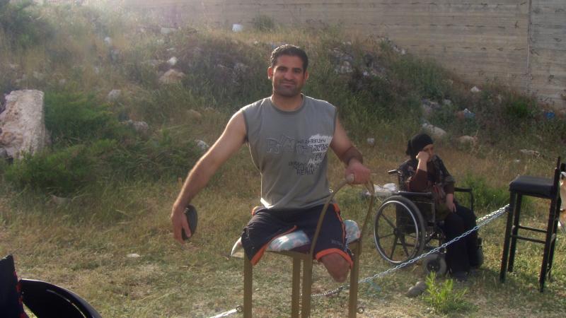 Noor Ismail holding a discus