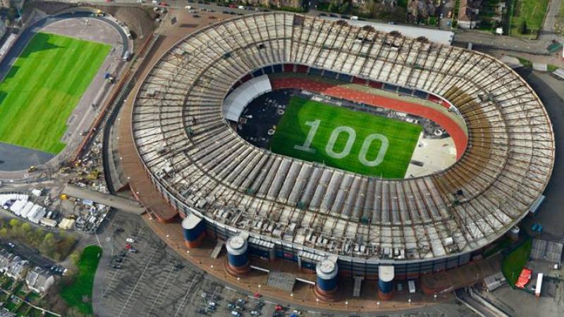 Picture of Glasgow 2014 stadium with 100 days to go written in the grass