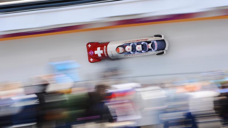 A bobsleigh goes so fast down the track it's a blur.