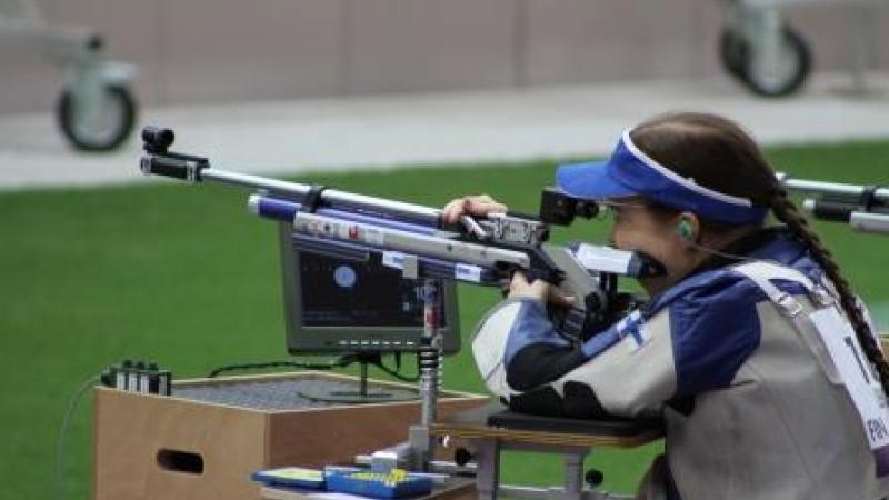 Minna Leinonen Shooting Women in a shooting range targeting