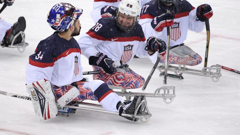 4 hockey players in sledges chat