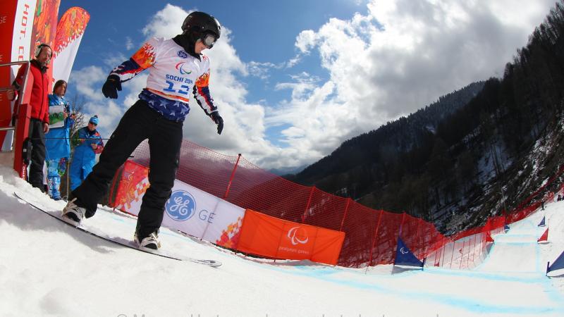 Evan Strong, USA begins his gold medal run on his snowboard.