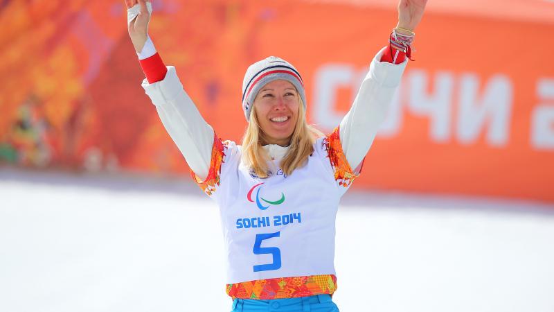 Upper body of woman celebrating