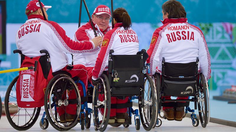 Wheelchair Curling Semi-final (RUS vs GBR) Team Russia group huddle