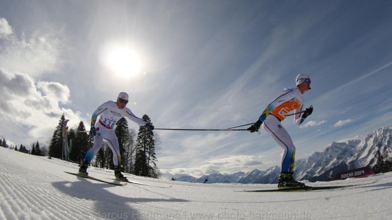 Zebastian Modin, Sweeden holds on to his guides pole as he goes downhill