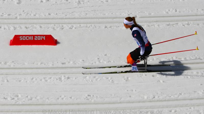 Oksana Masters, USA pushes off her poles 