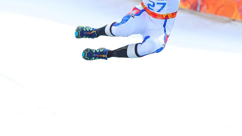 Man jumping in the air on a podium