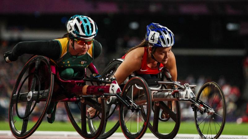 Two female wheelchair racers