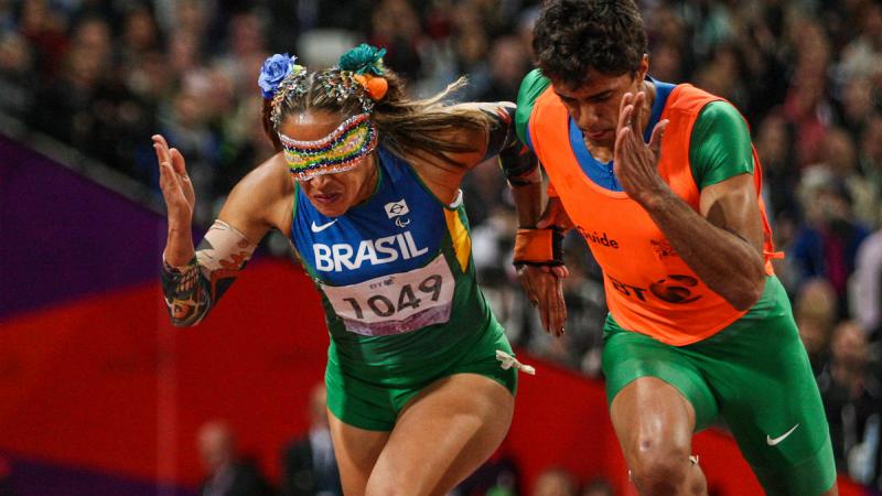 Brazilian athlete Terezinha Guilhermina with her guide