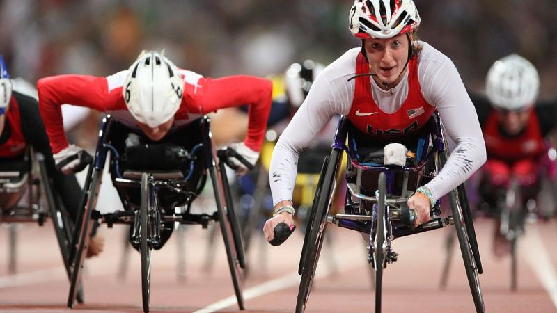 Wheelchair racers on the track of a stadium