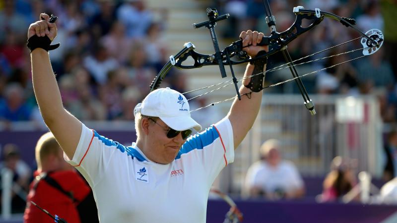 Finland's Jere Forsberg celebrates after winning the gold in the Men's Individual Compound Archery-Open at London 2012.