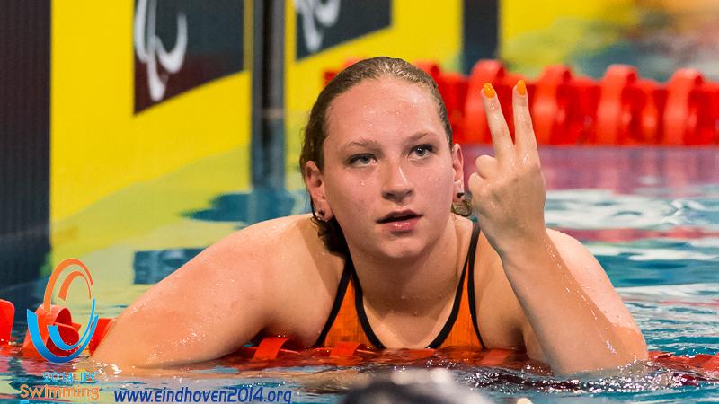 A Dutch swimmer after winning a medal at the 2014 IPC Swimming European Championships.