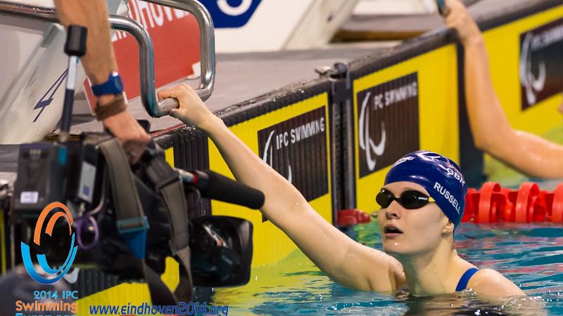 A British swimmer is filmed on completed a race a the 2014 IPC Swimming European Championships