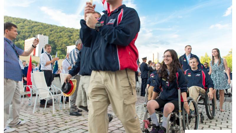 Wheelchair athlete from the USA behind the flag barer during the Opening Ceremony of the 2014 IPC Shooting World Championships Suhl, Germany