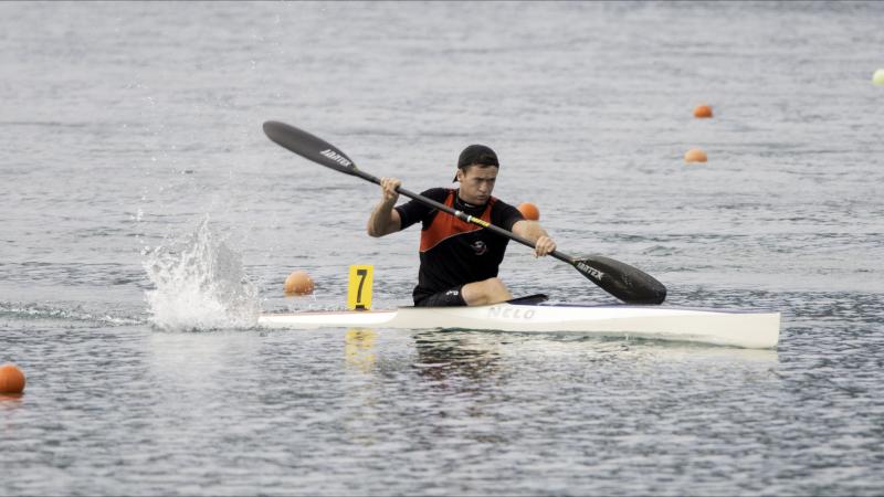 Man in canoe in action on the water