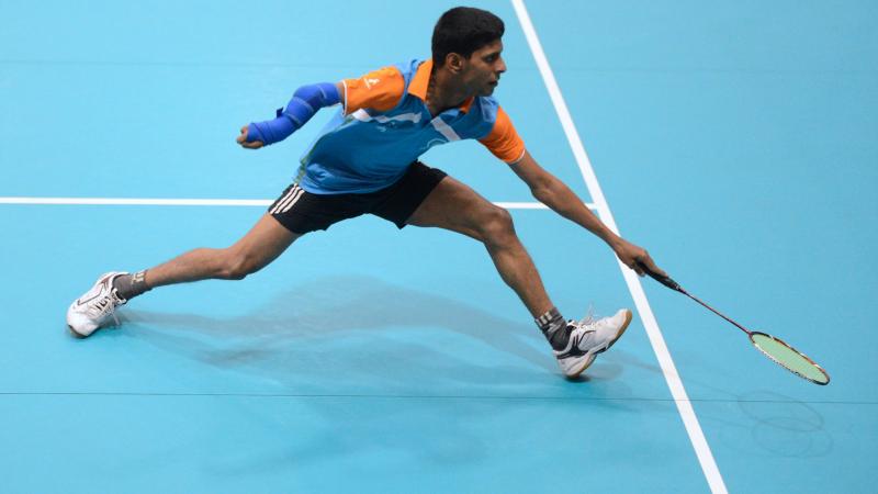 Man playing badminton 