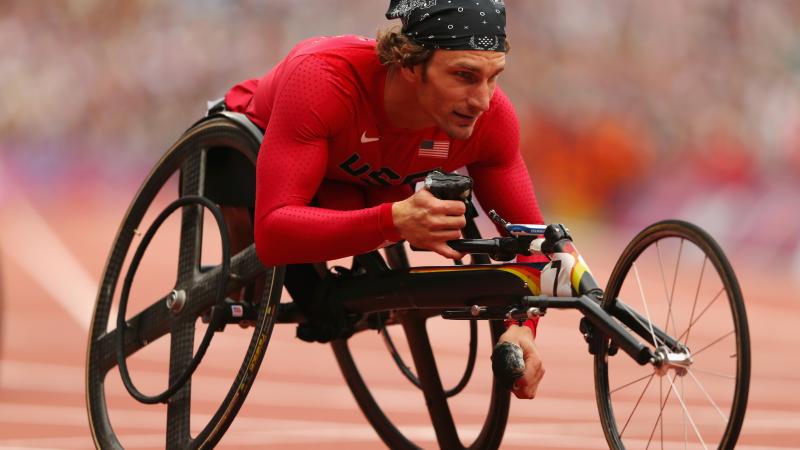 USA athlete leaning forward in his wheelchair on the track at London 2012