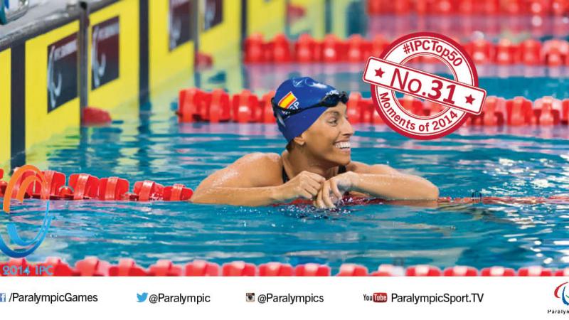 Women in swimming pool, smiling