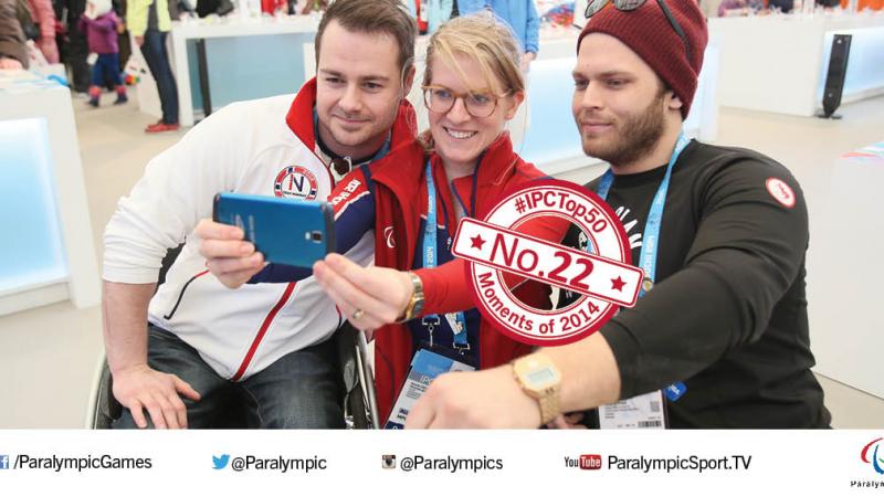 Two athletes join in a selfie during the Sochi 2014 Paralympic Winter Games