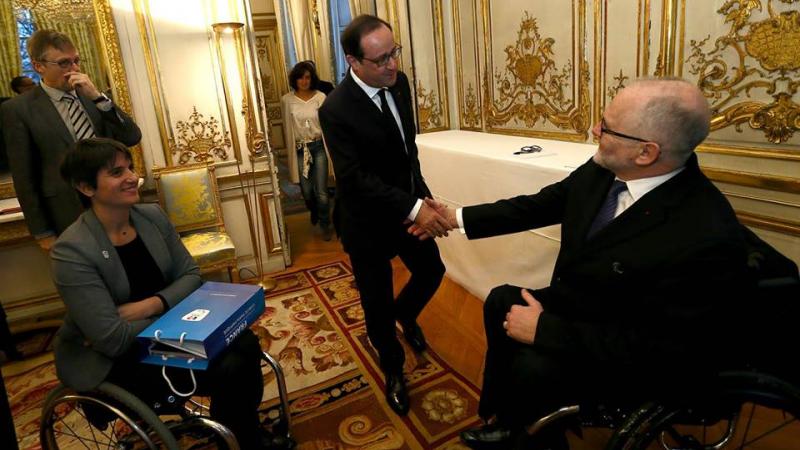 IPC President Sir Philip Craven and French NPC President Emmanuelle Assmann meet President Hollande of France.