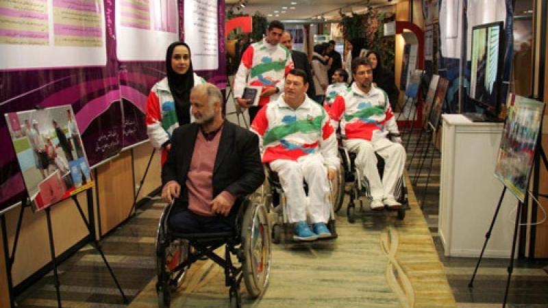 Members of the Iranian Parliament visit the NPC Iran exhibition in December 2014.