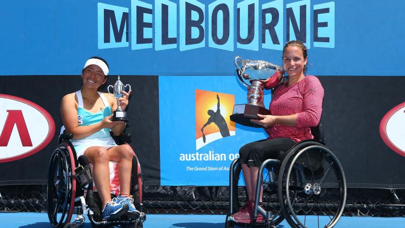 The Netherlands' Jiske Griffioen poses her with her trophy after winning her women's wheelchair singles final against Japan's Yui Kamiji at the Australian Open 2015 Wheelchair Championships. 