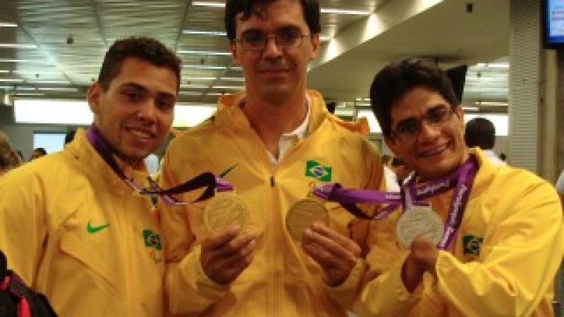 Brazil's Ciro Winckler with Alan Oliveira and Yohansson Nascimento.