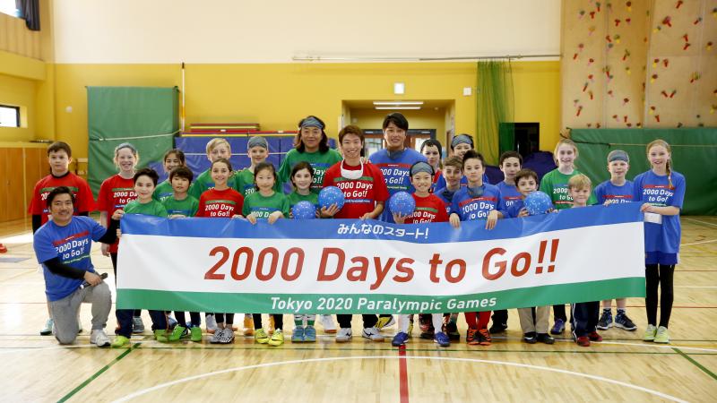 Children at the Tokyo International School celebrate 2000 days before Tokyo 2020 Paralympic Games