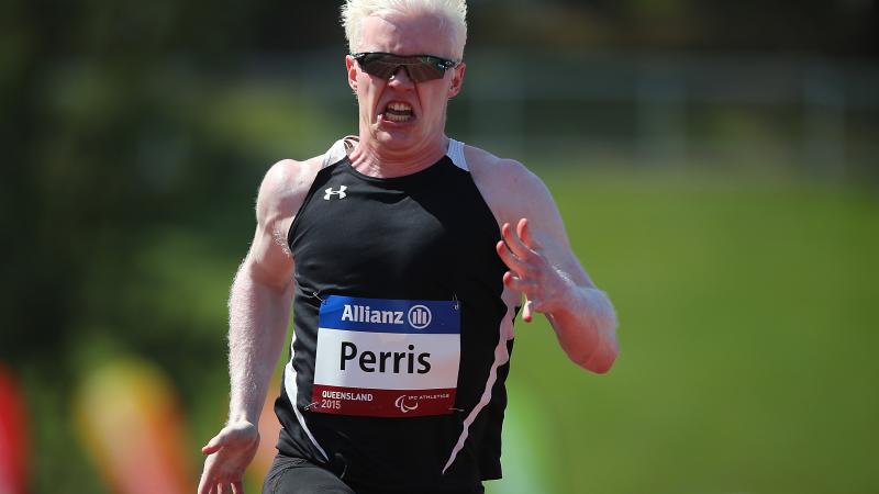 Chad Perris runs in the IPC Athletics Grand Prix Ambulant 100m heats during the Queensland Track Classic.