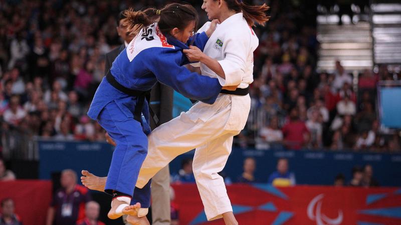 Two female judoka's fighting at the London 2012 Paralympics