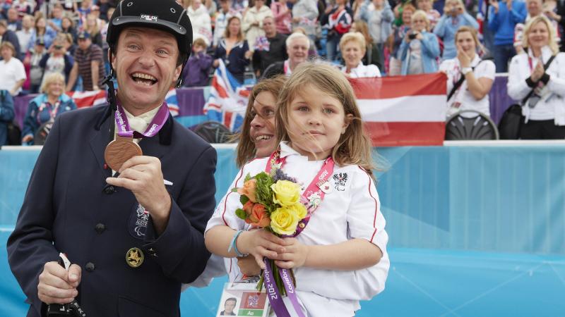 Pepo Puch pictured with his wife and daughter after medalling at the London 2012 Paralympic Games.