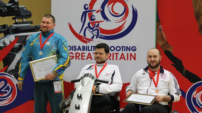 Tanguy De La Forest, Vasyl Kovalchuk and Ryan Cockbill at the 2015 IPC Shooting World Cup in Stoke Mandeville, Great Britain
