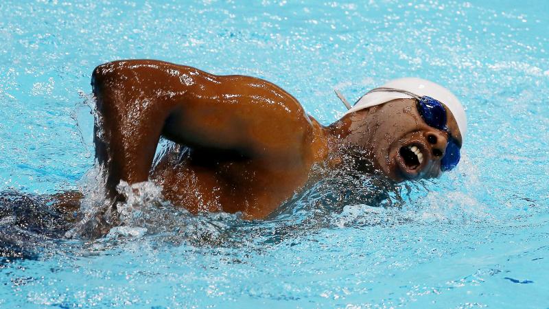 An S2 swimmer takes a breath during competition at London 2012.