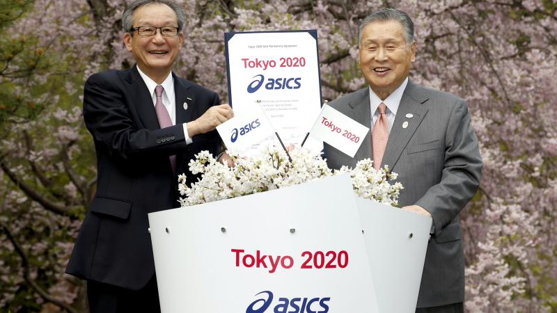 Motoi Oyama, President, CEO and Representative Director of ASICS; Yoshiro Mori, Tokyo 2020 President