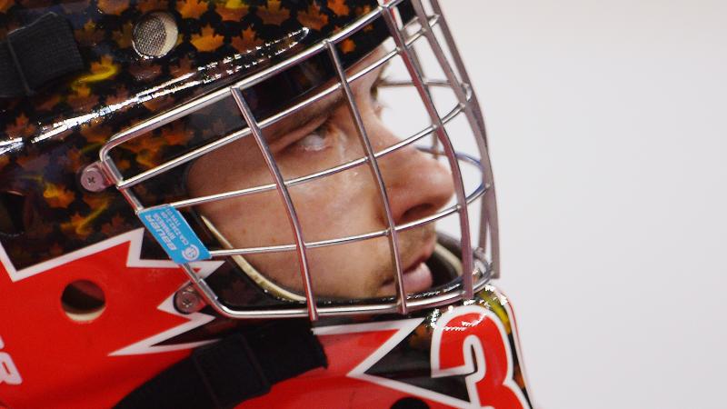 Goalkeeper Corbin Watson of Canada looks dejected after the Ice Sledge Hockey Play-off semi final between Canada and the United States of America at the Sochi 2014 Winter Paralympic Games.