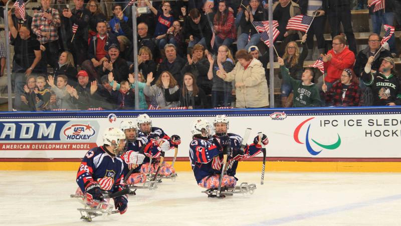 Paul Schaus, Josh Sweeney, Josh Pauls, Nikko Landeros, Luke McDermott compete at the 2015 IPC Ice Sledge Hockey World Championships A-Pool in Buffalo, USA.