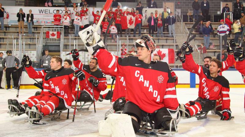 Canada salutes the crowd after defeating Russia, 3-2, in their semi-final game at Buffalo 2015.