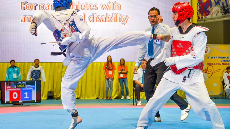 Two athletes doing taekwondo