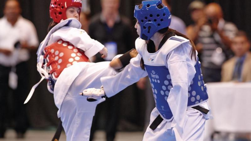 Two athletes doing taekwondo