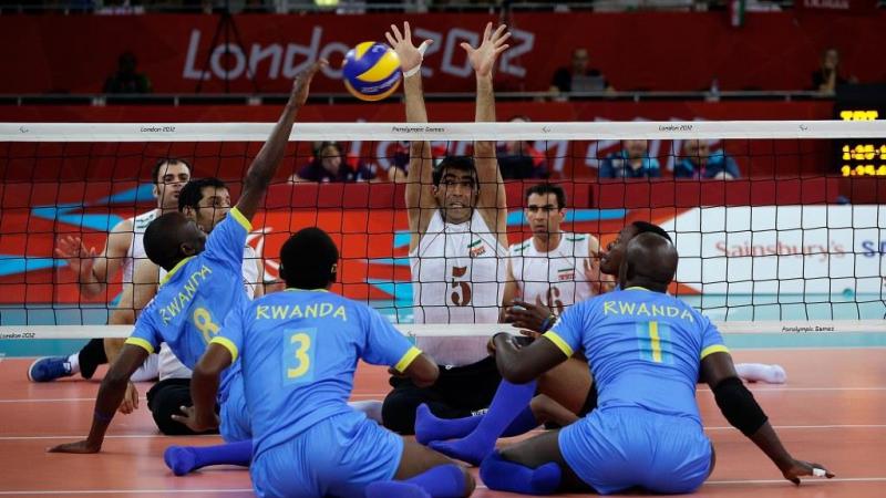 Rwanda vs Iran sitting volleyball Rwanda vs Iran during their Pool B preliminary round of the Sitting Volleyball tournament at the London 2012 Paralympic Games.