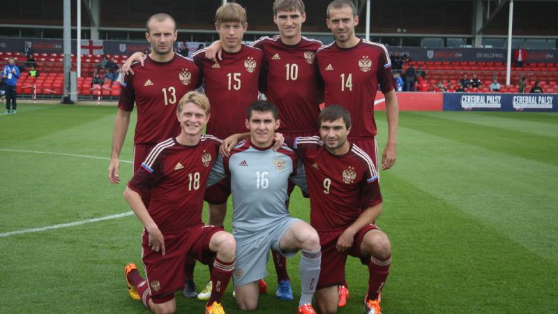 Football team lines up for team photo